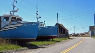 We pedaled this same road and saw these same boats, but the blue sky was nowhere to be seen on our visit. (Yarmouthonline photo)